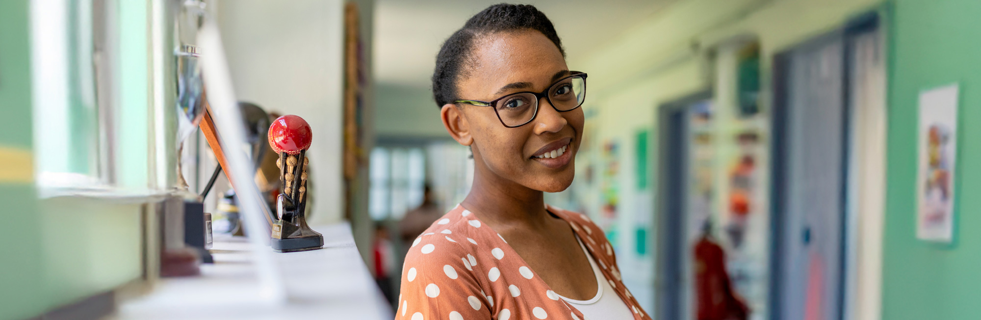 Woman smiling in the hallway